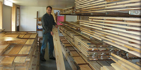 Stacking lumber in a storage room